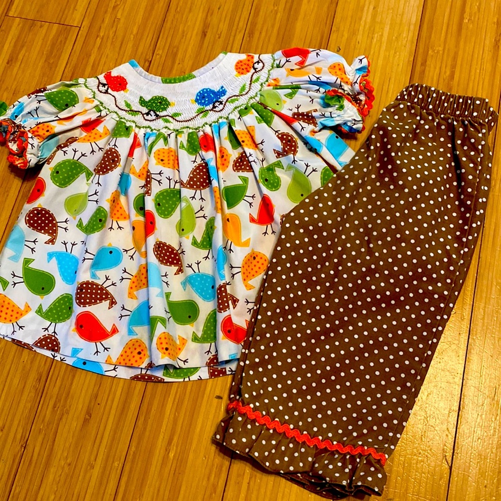 Beautiful smocked too and pant sets. Smoke free house